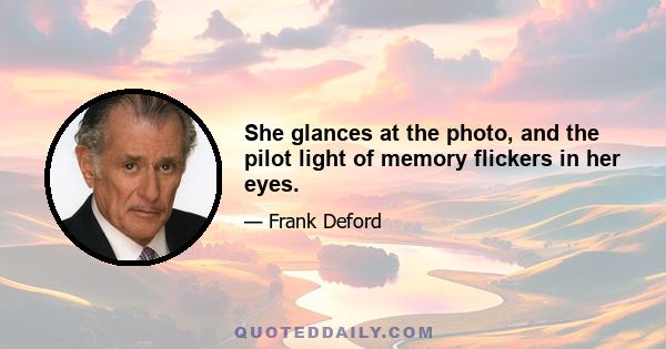 She glances at the photo, and the pilot light of memory flickers in her eyes.