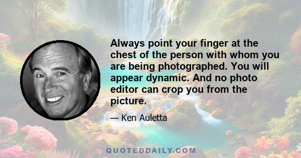 Always point your finger at the chest of the person with whom you are being photographed. You will appear dynamic. And no photo editor can crop you from the picture.