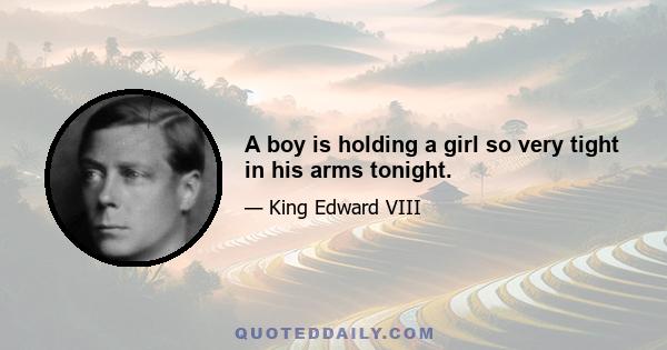 A boy is holding a girl so very tight in his arms tonight.